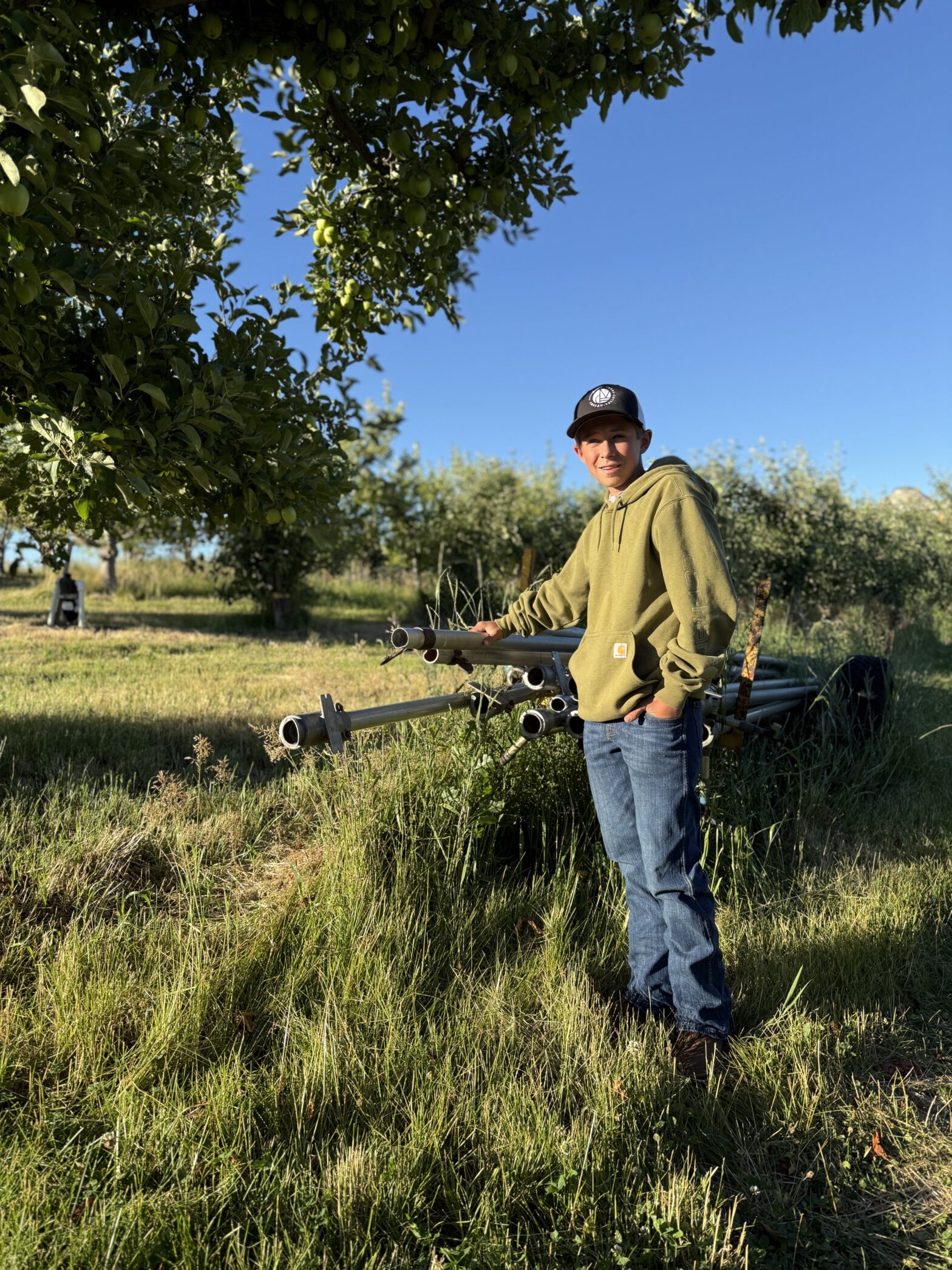 Carston, a farm kids summer story with irrigation hand lines at Chelan Valley Farms