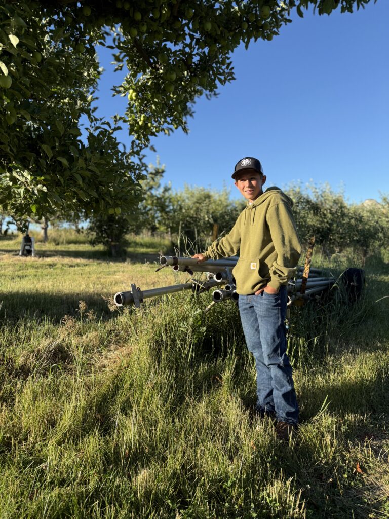 Carston, a farm kids summer story with irrigation hand lines at Chelan Valley Farms
