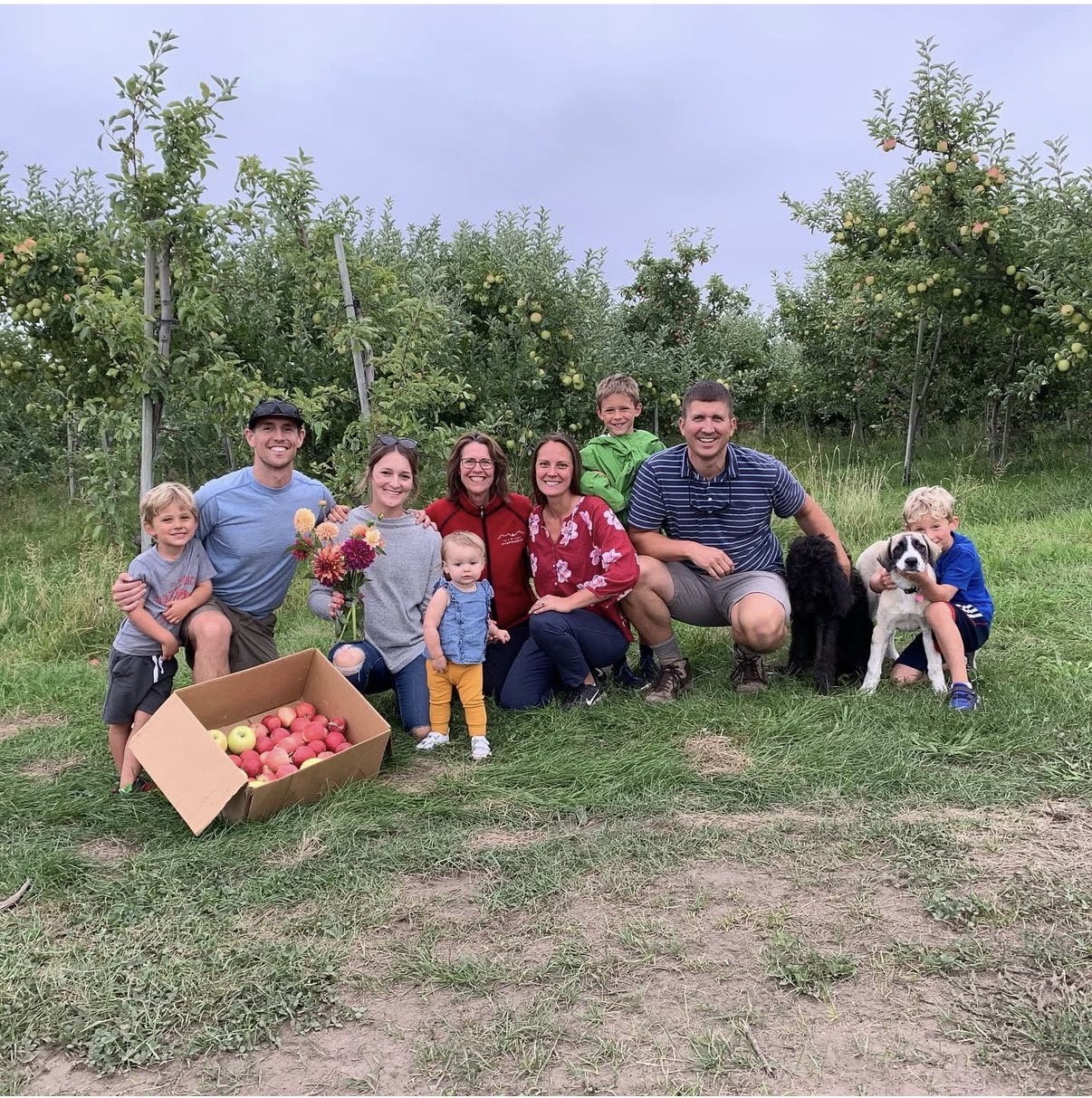Our first u-pick apples family in the orchard at Chelan Valley Farms in Manson, WA, 2019